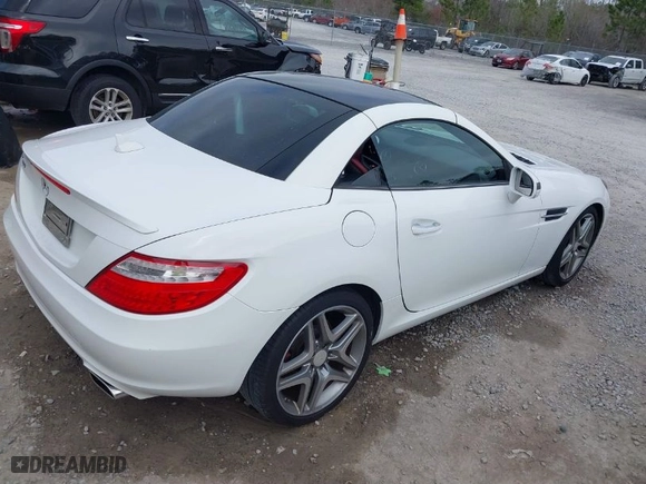 2016 Mercedes-Benz SLK with VIN WDDPK3JA9GF120832, listed as a IAAI auction lot 41642162 with 57,541 mi miles. Bid and sale history available at carsss.com. Image 4.
