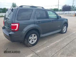 2009 Ford Escape Hybrid with VIN 1FMCU49319KC97511, listed as a IAAI auction lot 42735047 with 255,260 mi miles and . Bid and sale history available at DreamBid. Image 4.