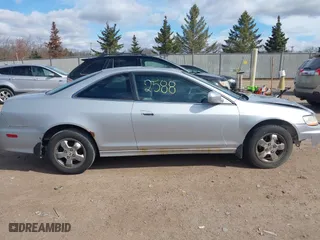 2001 Honda Accord Cpe EX with VIN 1HGCG31571A005892, listed as a IAAI auction lot 42022588 with 202,497 mi miles. Bid and sale history available at carsss.com. Image 14.
