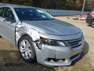 2016 Chevrolet Impala LT with VIN 2G1105SAXG9141836, listed as a IAAI auction lot 40740284 with 141,195 mi miles and . Bid and sale history available at DreamBid. Image 6.