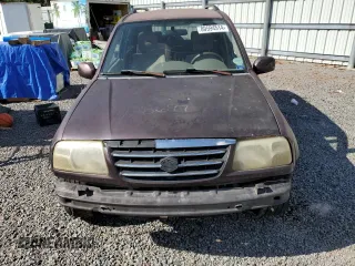 2003 Suzuki XL7 Touring z VIN JS3TY92V734100887, wystawiony jako Copart lot #80594514 z przebiegiem Nie podano mil oraz Szkoda całkowita • Salvage title. Historia ofert i sprzedaży dostępna na DreamBid. Obrazek 5.