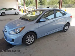 2013 Hyundai Accent GLS with VIN KMHCT4AE9DU556629, listed as a IAAI auction lot 42107644 with 152,274 mi miles. Bid and sale history available at carsss.com. Image 2.