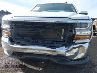2017 Chevrolet Silverado 1500 LT with VIN 3GCUKREC5HG414935, listed as a IAAI auction lot 41064938 with 197,767 mi miles and . Bid and sale history available at DreamBid. Image 6.
