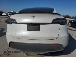 2023 Tesla Model Y Long Range with VIN 7SAYGAEE3PF767171, listed as a Copart auction lot 46057645 with Not Provided miles and Salvage Title. Bid and sale history available at DreamBid. Image 6.
