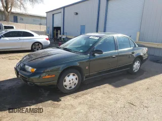 2000 Saturn SL z VIN 1G8ZG5286YZ181917, wystawiony jako Copart lot #43960675 z przebiegiem 220 481 mil mil oraz Szkody całkowita. Historia ofert i sprzedaży dostępna na DreamBid. Obrazek 1.