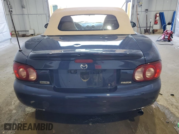 2001 Mazda MX-5 Miata with VIN JM1NB353510209224, listed as a Copart auction lot 51736955 with 103,732 mi miles and Salvage Title. Bid and sale history available at DreamBid. Image 6.