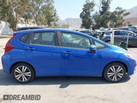 2015 Honda Fit EX-L z VIN 3HGGK5H85FM730218, wystawiony jako IAAI lot #42818190 z przebiegiem 153 822 mil mil oraz . Historia ofert i sprzedaży dostępna na DreamBid. Obrazek 13.