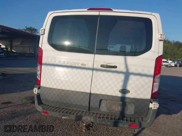 2015 Ford Transit Cargo with VIN 1FTNE1ZM7FKA13506, listed as a IAAI auction lot 40449761 with 92,881 mi miles and . Bid and sale history available at carsss.com. Image 16.