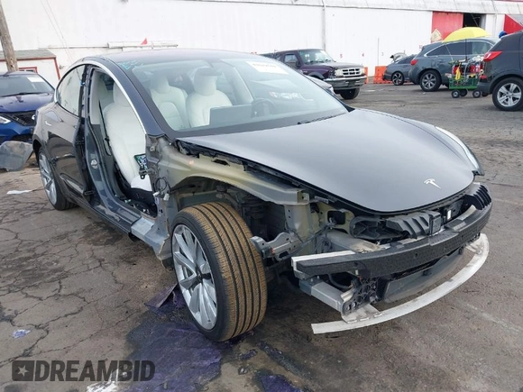 2018 Tesla Model 3 Long Range Battery with VIN 5YJ3E1EB9JF097118, listed as a IAAI auction lot 41619510 with 64,132 mi miles and . Bid and sale history available at DreamBid. Image 1.