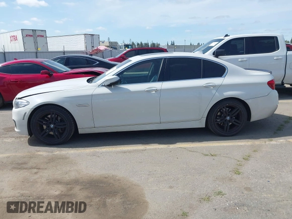 2015 BMW 5 Series 535i with VIN WBA5B1C58FG128061, listed as a IAAI auction lot 41838117 with 97,131 mi miles and . Bid and sale history available at carsss.com. Image 14.