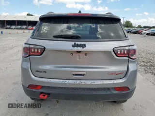 2020 Jeep Compass Trailhawk z VIN 3C4NJDDB6LT202919, wystawiony jako Copart lot #66373195 z przebiegiem 122 039 mil mil oraz Czysty tytuł • Clean title. Historia ofert i sprzedaży dostępna na DreamBid. Obrazek 6.