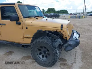 2013 Jeep Wrangler Unlimited Sahara with VIN 1C4BJWEG8DL638404, listed as a IAAI auction lot 42586604 with 43,953 mi miles and . Bid and sale history available at DreamBid. Image 6.