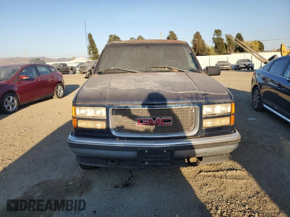 1999 GMC Yukon with VIN 1GKEK13RXXJ748733, listed as a Copart auction lot 74125914 with 172,766 mi miles and Clean Title. Bid and sale history available at carsss.com. Image 5.