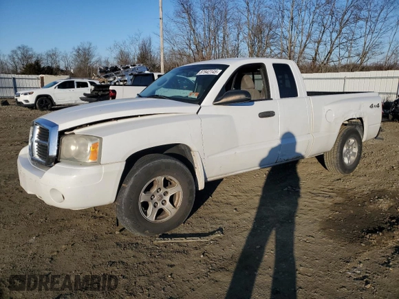 2006 Dodge Dakota SLT with VIN 1D7HW42KX6S716639, listed as a Copart auction lot 87942145 with Not Provided miles and Salvage Title. Bid and sale history available at carsss.com. Image 1.