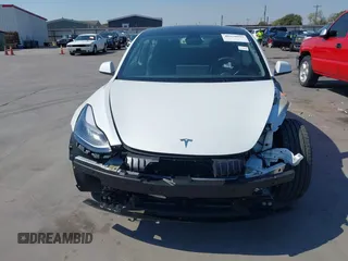 2023 Tesla Model 3 with VIN 5YJ3E1EA9PF585632, listed as a IAAI auction lot 40520993 with 7,775 mi miles and . Bid and sale history available at DreamBid. Image 13.