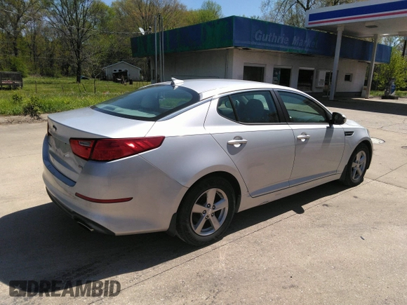2014 Kia Optima LX with VIN 5XXGM4A70EG340051, listed as a IAAI auction lot 42048762 with 146,519 mi miles. Bid and sale history available at carsss.com. Image 4.