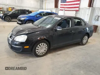2009 Volkswagen Jetta S z VIN 3VWJM71K89M128768, wystawiony jako Copart lot #66138715 z przebiegiem 103 711 mil mil oraz Czysty tytuł • Clean title. Historia ofert i sprzedaży dostępna na DreamBid. Obrazek 1.