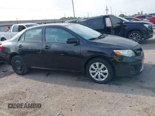 2012 Toyota Corolla L with VIN 2T1BU4EE9CC802405, listed as a IAAI auction lot 41962255 with 209,968 mi miles. Bid and sale history available at carsss.com. Image 13.
