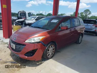 2012 Mazda 5 Sport z VIN JM1CW2BL4C0119625, wystawiony jako IAAI lot #42306364 z przebiegiem 138 906 mil mil oraz . Historia ofert i sprzedaży dostępna na DreamBid. Obrazek 2.