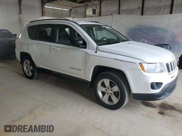2012 Jeep Compass Sport with VIN 1C4NJDBB3CD522739, listed as a Copart auction lot 50993045 with 124,799 mi miles and Clean Title. Bid and sale history available at carsss.com. Image 4.