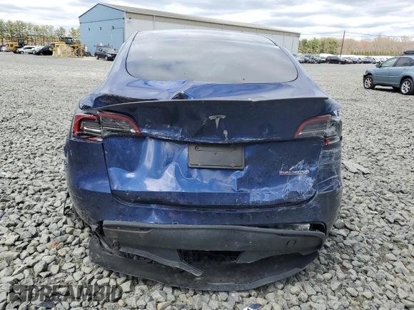 2024 Tesla Model Y Performance z VIN 7SAYGDEF6RA268195, wystawiony jako Copart lot #53211075 z przebiegiem Nie podano mil oraz Szkoda całkowita • Salvage title. Historia ofert i sprzedaży dostępna na DreamBid. Obrazek 6.