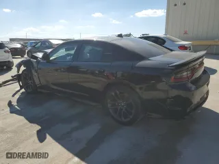 2022 Dodge Charger Scat Pack with VIN 2C3CDXGJXNH180037, listed as a Copart auction lot 77573324 with 15,583 mi miles and Salvage Title. Bid and sale history available at carsss.com. Image 2.