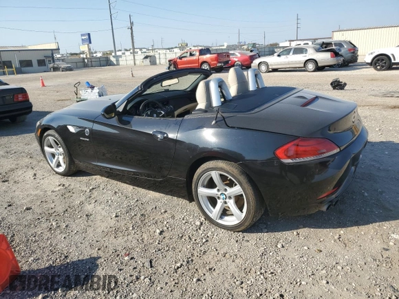2012 BMW Z4 sDrive28i with VIN WBALL5C5XCE716711, listed as a Copart auction lot 75706534 with 89,948 mi miles and Clean Title. Bid and sale history available at carsss.com. Image 2.
