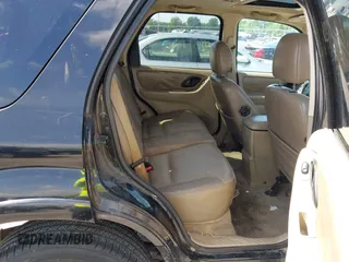 2003 Ford Escape Limited z VIN 1FMCU941X3KB46631, wystawiony jako IAAI lot #42315601 z przebiegiem 202 237 mil mil oraz . Historia ofert i sprzedaży dostępna na DreamBid. Obrazek 8.
