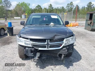 2017 Dodge Journey SE with VIN 3C4PDCABXHT538885, listed as a IAAI auction lot 41919599 with 170,311 mi miles and . Bid and sale history available at DreamBid. Image 12.
