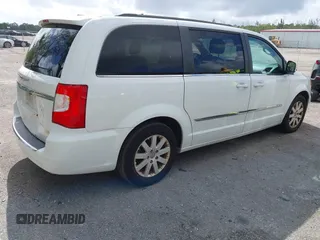 2016 Chrysler Town & Country Touring with VIN 2C4RC1BG8GR293872, listed as a IAAI auction lot 41948314 with 194,780 mi miles. Bid and sale history available at carsss.com. Image 4.