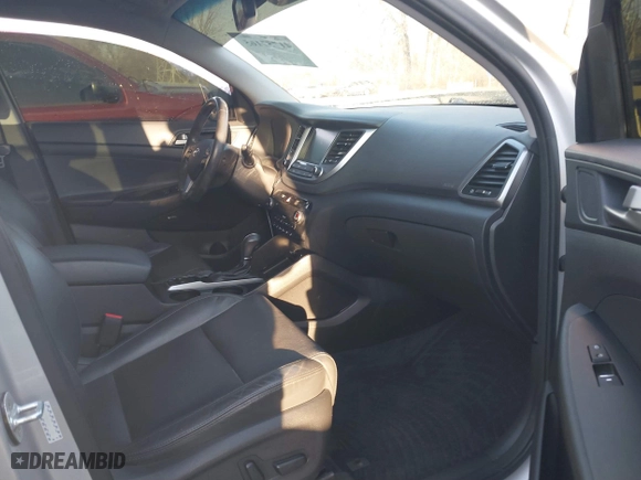 2018 Hyundai Tucson Value with VIN KM8J3CA23JU651464, listed as a IAAI auction lot 41757165 with 72,339 mi miles. Bid and sale history available at carsss.com. Image 5.