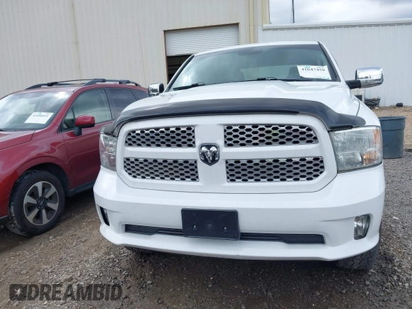 2015 Ram 1500 Tradesman with VIN 1C6RR7KG8FS648142, listed as a IAAI auction lot 41647459 with 100,696 mi miles and . Bid and sale history available at DreamBid. Image 12.