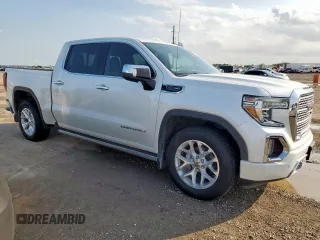 2020 GMC Sierra 1500 Denali with VIN 1GTU9FEL1LZ109497, listed as a Copart auction lot 57228625 with 54,267 mi miles and Salvage title. Bid and sale history available at DreamBid. Image 4.