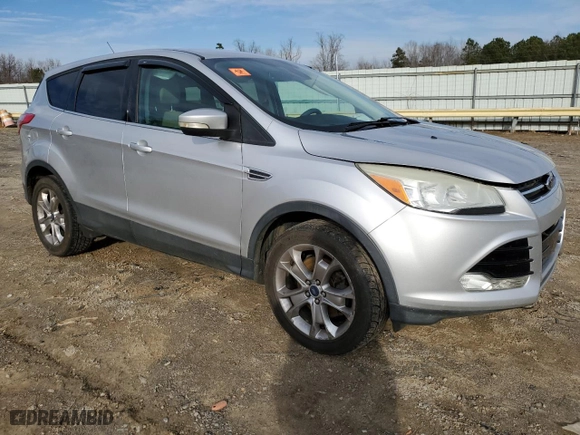 2013 Ford Escape SEL with VIN 1FMCU9HX2DUC66573, listed as a Copart auction lot 43970725 with 145,428 mi miles and Salvage Title. Bid and sale history available at carsss.com. Image 4.