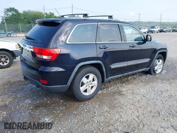 2011 Jeep Grand Cherokee Laredo with VIN 1J4RR4GG5BC622628, listed as a IAAI auction lot 42402893 with 163,731 mi miles and . Bid and sale history available at DreamBid. Image 4.