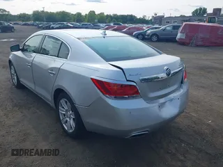 2012 Buick LaCrosse Premium 1 z VIN 1G4GD5E33CF181997, wystawiony jako IAAI lot #42411613 z przebiegiem 59 246 mil mil oraz . Historia ofert i sprzedaży dostępna na DreamBid. Obrazek 6.