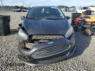 2015 Ford Fiesta SE z VIN 3FADP4EJ0FM108474, wystawiony jako Copart lot #78352184 z przebiegiem 160 583 mil mil oraz Szkoda całkowita • Salvage title. Historia ofert i sprzedaży dostępna na DreamBid. Obrazek 5.