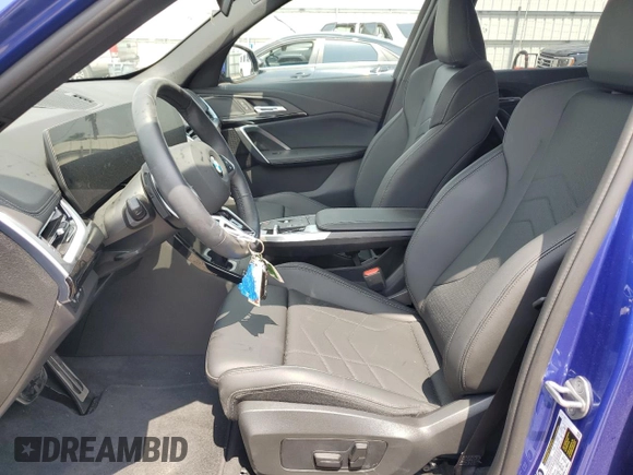 2024 BMW X1 xDrive28i with VIN WBX73EF06R5007063, listed as a Copart auction lot 56143075 with 2,947 mi miles and Salvage title. Bid and sale history available at DreamBid. Image 7.