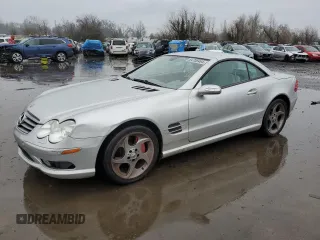 2005 Mercedes-Benz SL 500 with VIN WDBSK75F35F096881, listed as a Copart auction lot 84708464 with 100,248 mi miles and Salvage Title. Bid and sale history available at DreamBid. Image 1.