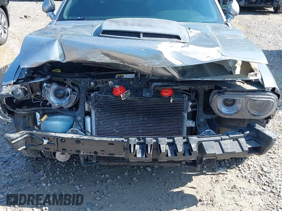 2014 Dodge Challenger R/T z VIN 2C3CDYBT9EH139932, wystawiony jako IAAI lot #42261252 z przebiegiem 95 241 mil mil oraz . Historia ofert i sprzedaży dostępna na DreamBid. Obrazek 6.