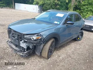 2023 Mazda CX-30 S Preferred z VIN 3MVDMBCM4PM558181, wystawiony jako IAAI lot #42589333 z przebiegiem 12 384 mil mil oraz . Historia ofert i sprzedaży dostępna na DreamBid. Obrazek 18.