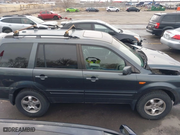 2006 Honda Pilot EX-L with VIN 2HKYF18526H563831, listed as a IAAI auction lot 41255427 with 237,074 mi miles. Bid and sale history available at carsss.com. Image 13.