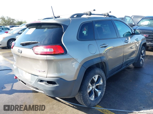 2017 Jeep Cherokee Trailhawk L Plus with VIN 1C4PJMBB6HW654172, listed as a IAAI auction lot 41851236 with 104,263 mi miles. Bid and sale history available at carsss.com. Image 4.