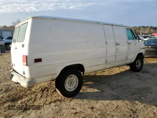 1992 GMC Vandura z VIN 2GTGG39KXN4515226, wystawiony jako Copart lot #85211254 z przebiegiem 594 809 mil mil oraz Szkody całkowita. Historia ofert i sprzedaży dostępna na DreamBid. Obrazek 3.