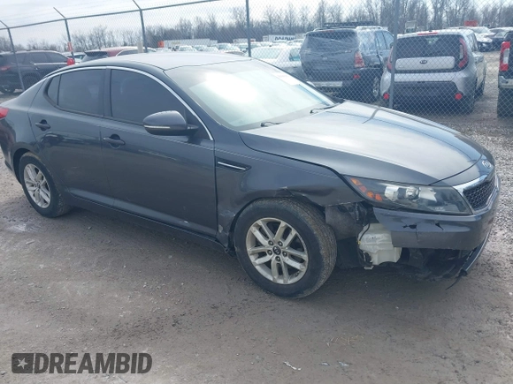 2011 Kia Optima LX z VIN KNAGM4A73B5166988, wystawiony jako IAAI lot #41689192 z przebiegiem 149 123 mil mil oraz . Historia ofert i sprzedaży dostępna na DreamBid. Obrazek 1.