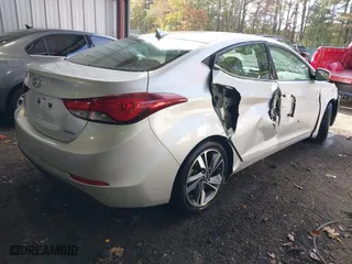 2014 Hyundai Elantra SE with VIN KMHDH4AE4EU165055, listed as a IAAI auction lot 40819849 with 127,536 mi miles. Bid and sale history available at carsss.com. Image 4.