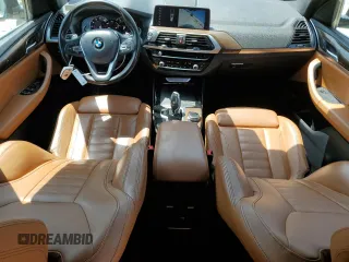 2019 BMW X3 sDrive30i with VIN 5UXTR7C57KLE97733, listed as a Copart auction lot 50323485 with 103,917 mi miles and Salvage Title. Bid and sale history available at carsss.com. Image 8.