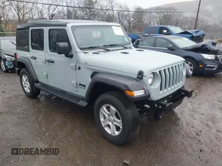 2023 Jeep Wrangler Sport S with VIN 1C4HJXDN5PW609316, listed as a IAAI auction lot 40960863 with 15,614 mi miles and . Bid and sale history available at DreamBid. Image 1.
