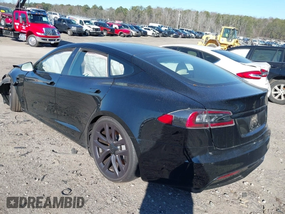 2021 Tesla Model S Long Range z VIN 5YJSA1E50MF438864, wystawiony jako IAAI lot #41190778 z przebiegiem Nie podano mil oraz . Historia ofert i sprzedaży dostępna na DreamBid. Obrazek 3.