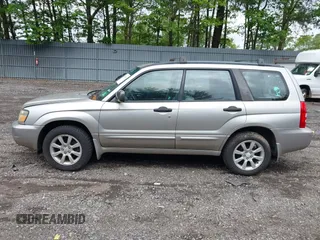 2005 Subaru Forester XS with VIN JF1SG65605H745494, listed as a IAAI auction lot 42382364 with 256,505 mi miles and . Bid and sale history available at DreamBid. Image 14.